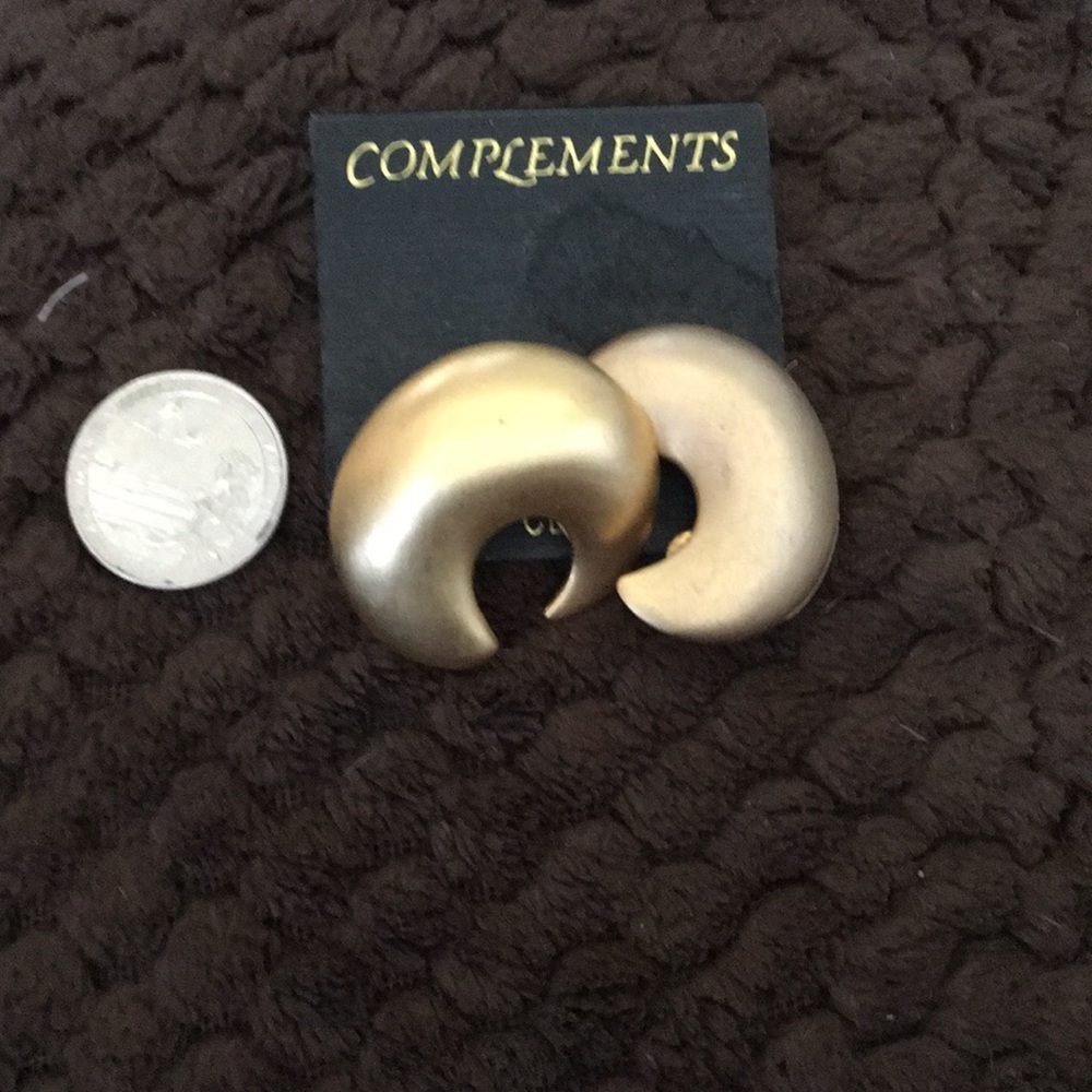 Complements large gold tone clip earrings